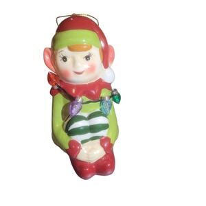 Mr Christmas Follow the Magic Santa's Elf Light Up Wreath Figure Ornament